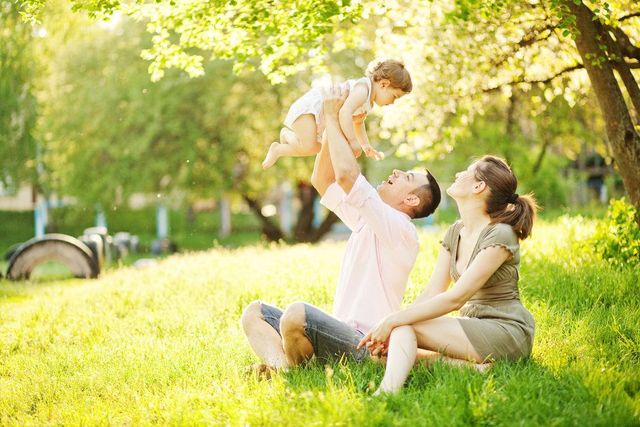 Family with a baby outdoors