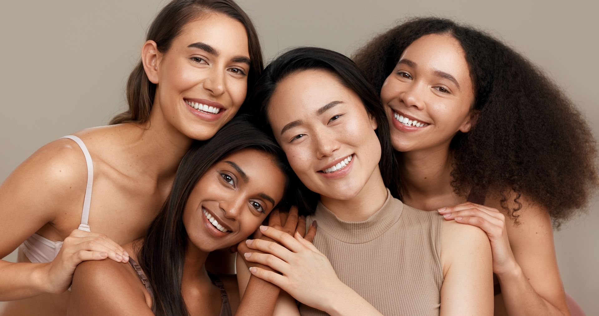 Diverse group of women posing together