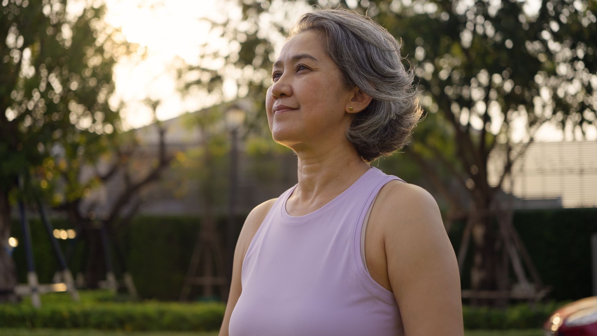 Woman outdoors at sunset
